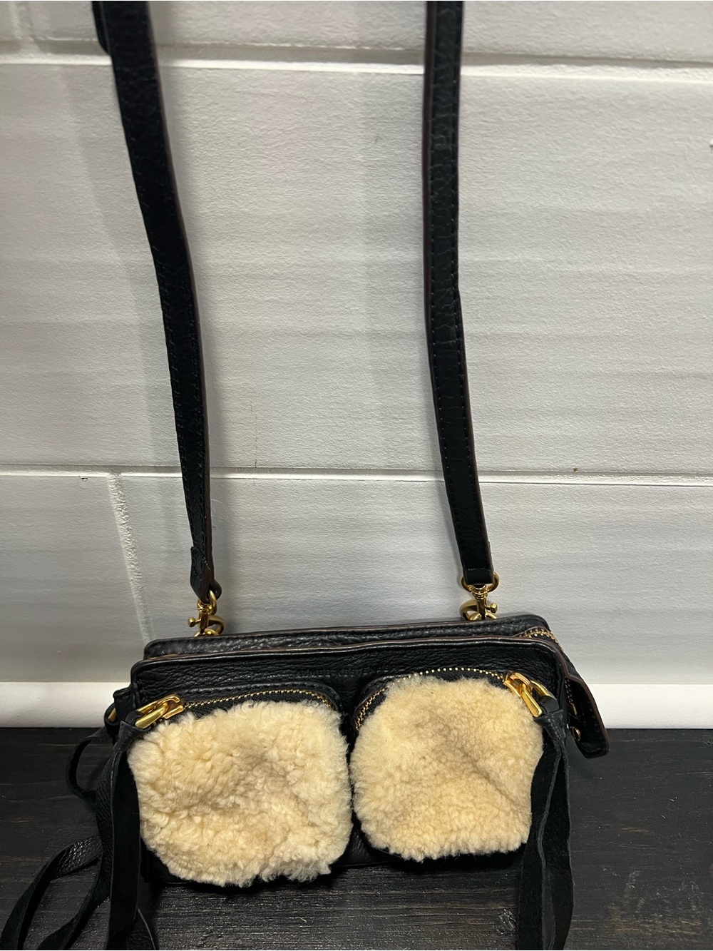Black Women's Crossbody Bag with Cream Shearling Pockets
Aimee Kestenberg